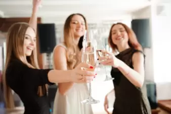 Group people with champagne dancing at the party