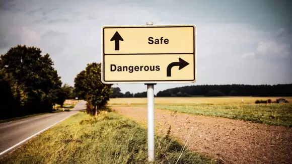 safety vs dangerous street sign