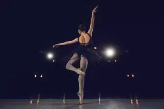 back view of a ballet dancer on stage