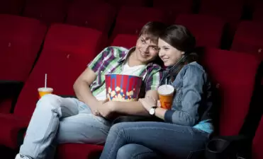 Young couple at the movies