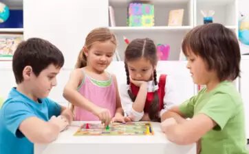 children playing a board game