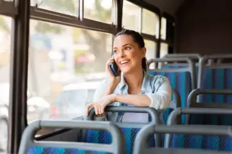 woman talking on the phone on the bus