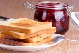 Toast with strawberry jam and butter