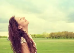 Woman practicing deep breathing