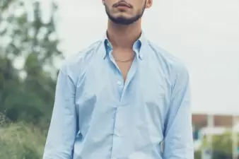 Man wearing blue linen shirt