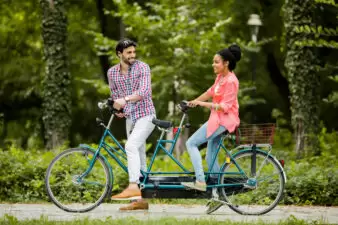 couple on a tandem bike