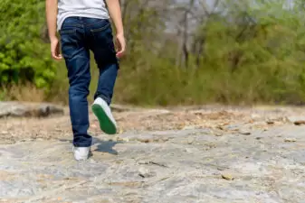 man balancing on his foot