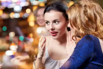 Women gossiping at a party