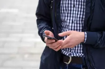 Young man using his phone