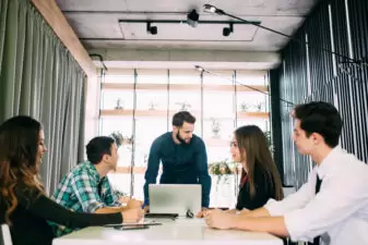 Young group of people discussing business plans