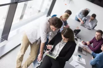 Business people looking at a tablet