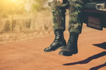 soldier legs on the back of truck