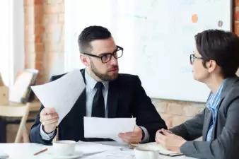 man holding paperwork