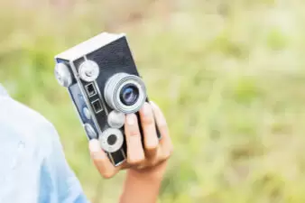 woman holding a camera