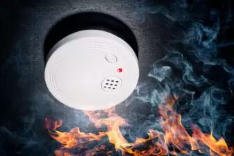 Smoke detector with flames and smoke