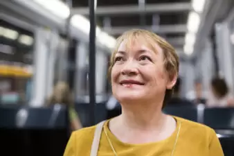 Older woman on a bus