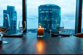 Candle and glasses on a restaurant table