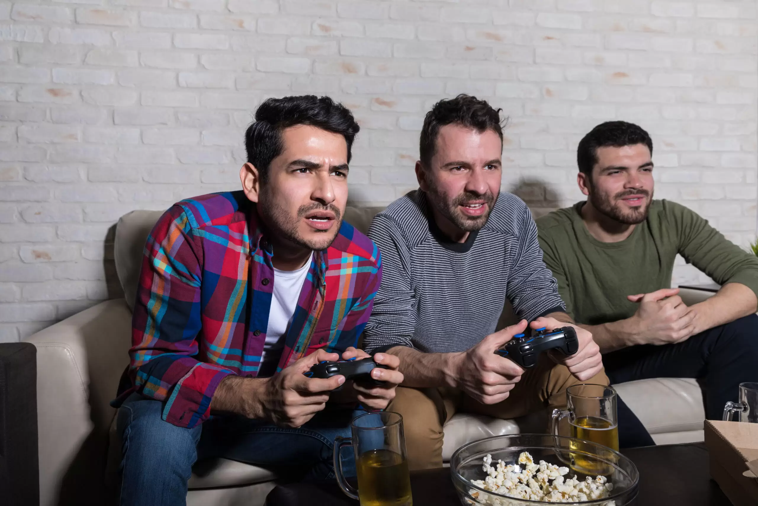 Stressed Gamers Playing Videogame At Home