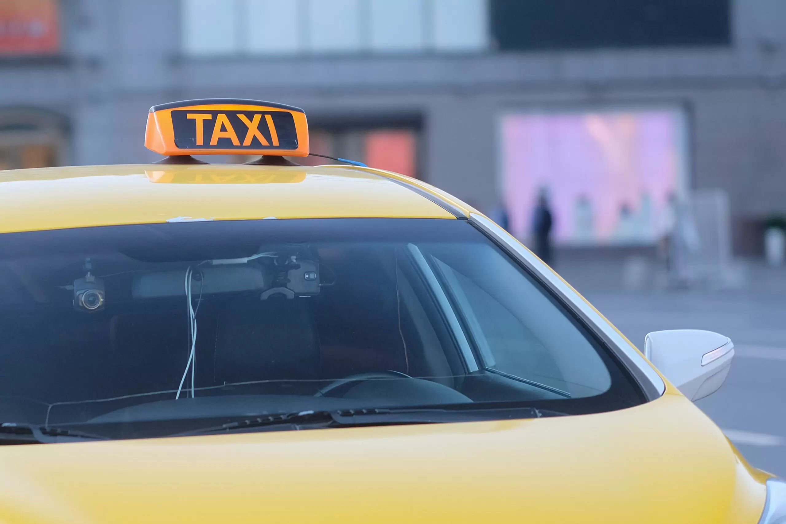 Moscow, Russia - May, 3, 2017: Taxi on a parking in a center of Moscow