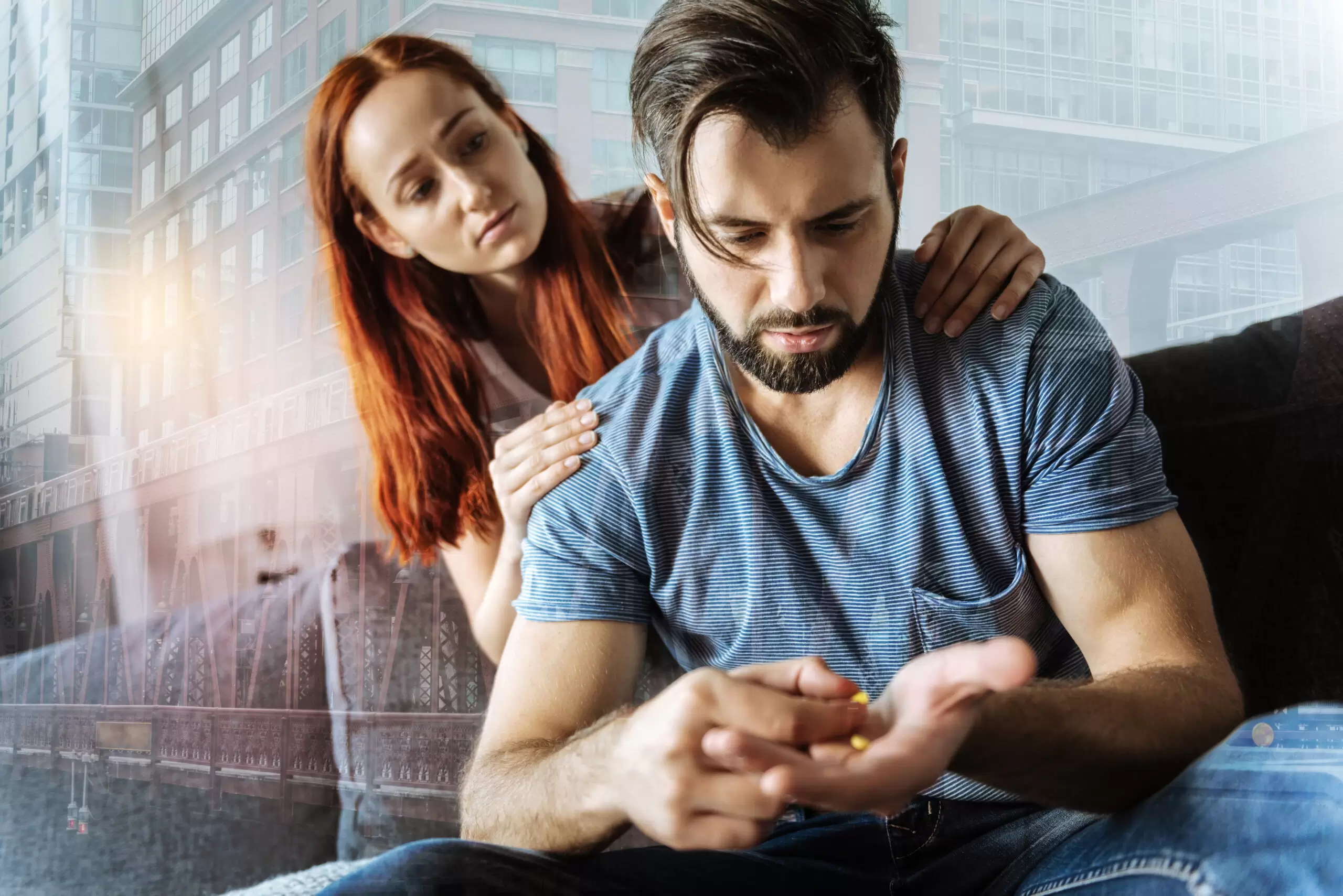 Worried girl embracing her boyfriend